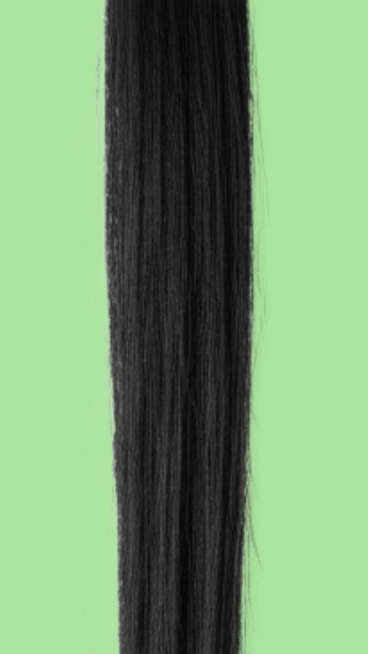straight hair strands on a green background